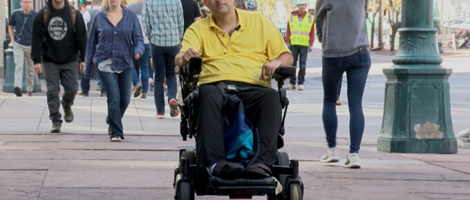 man in electric wheelchair