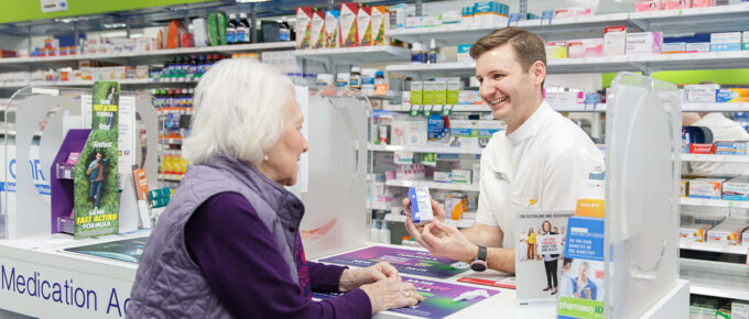 pharmacist talking to customer